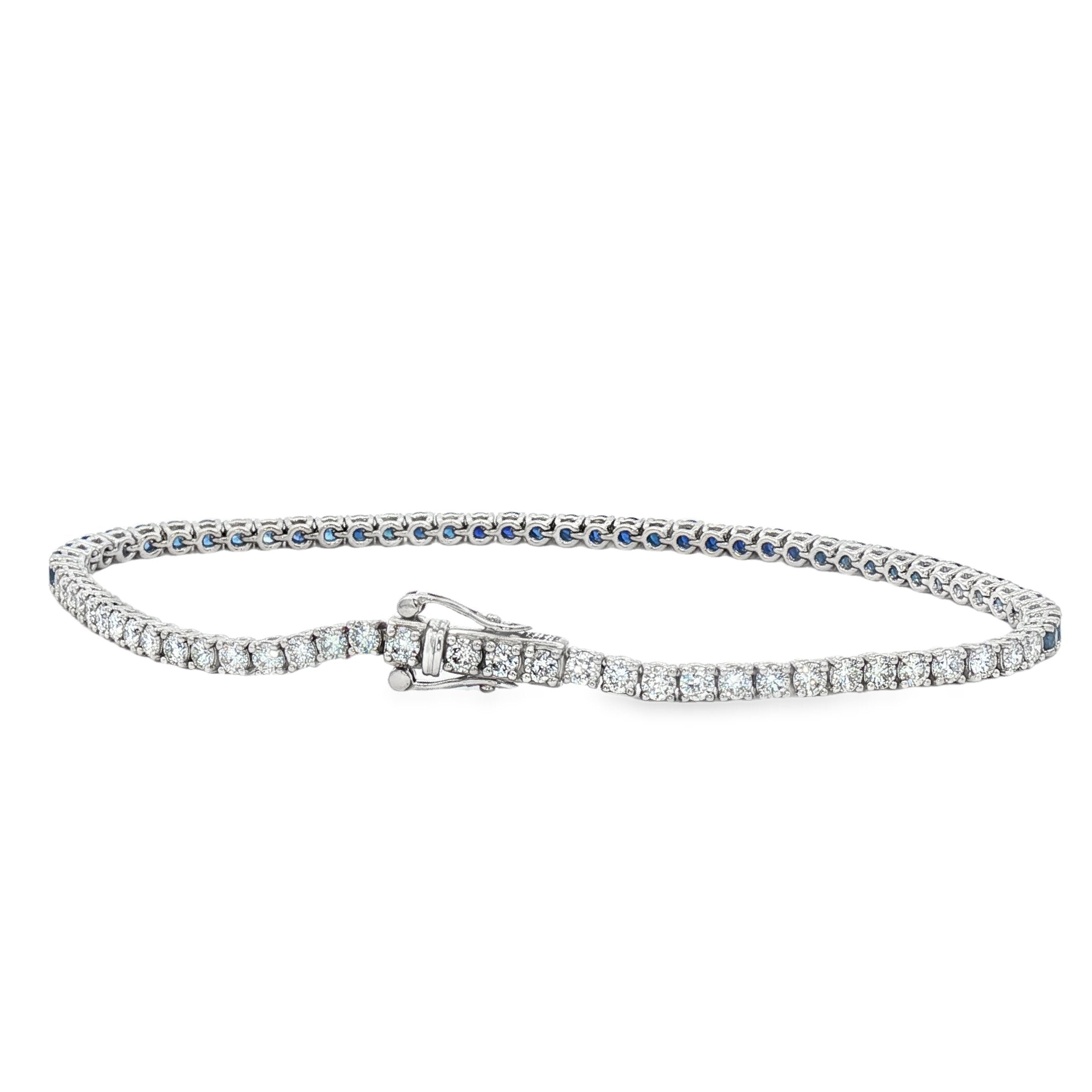 18kt White Gold Diamond And Blue Sapphire Tennis Bracelet