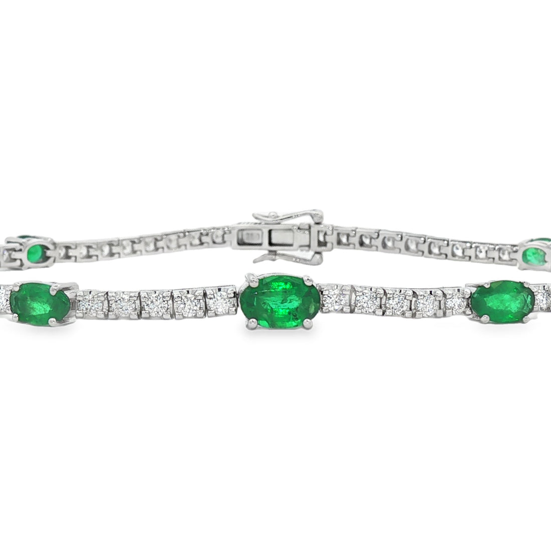18kt White Gold Diamond And Green Emerald Tennis Bracelet